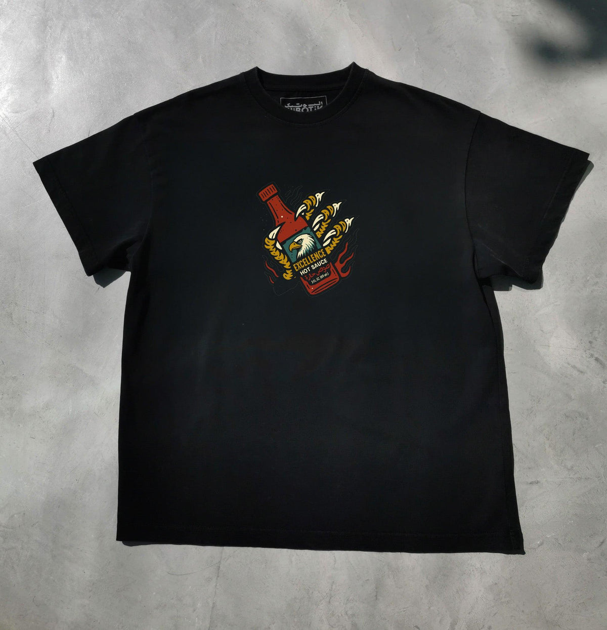 The Eagle of Excellence tee in black, front view