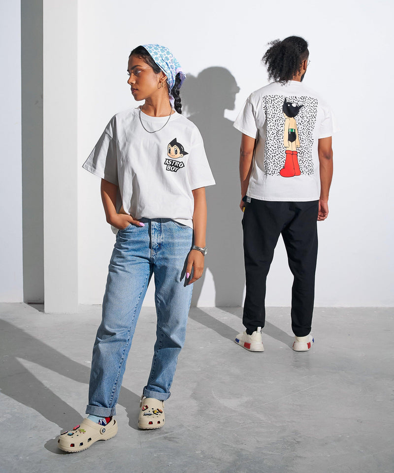 Oversized white anime tribute tee by Elbotik, worn front view
