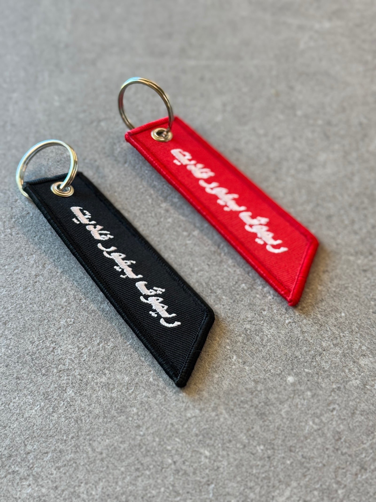 Remove Before Flight keychain with metal keyring