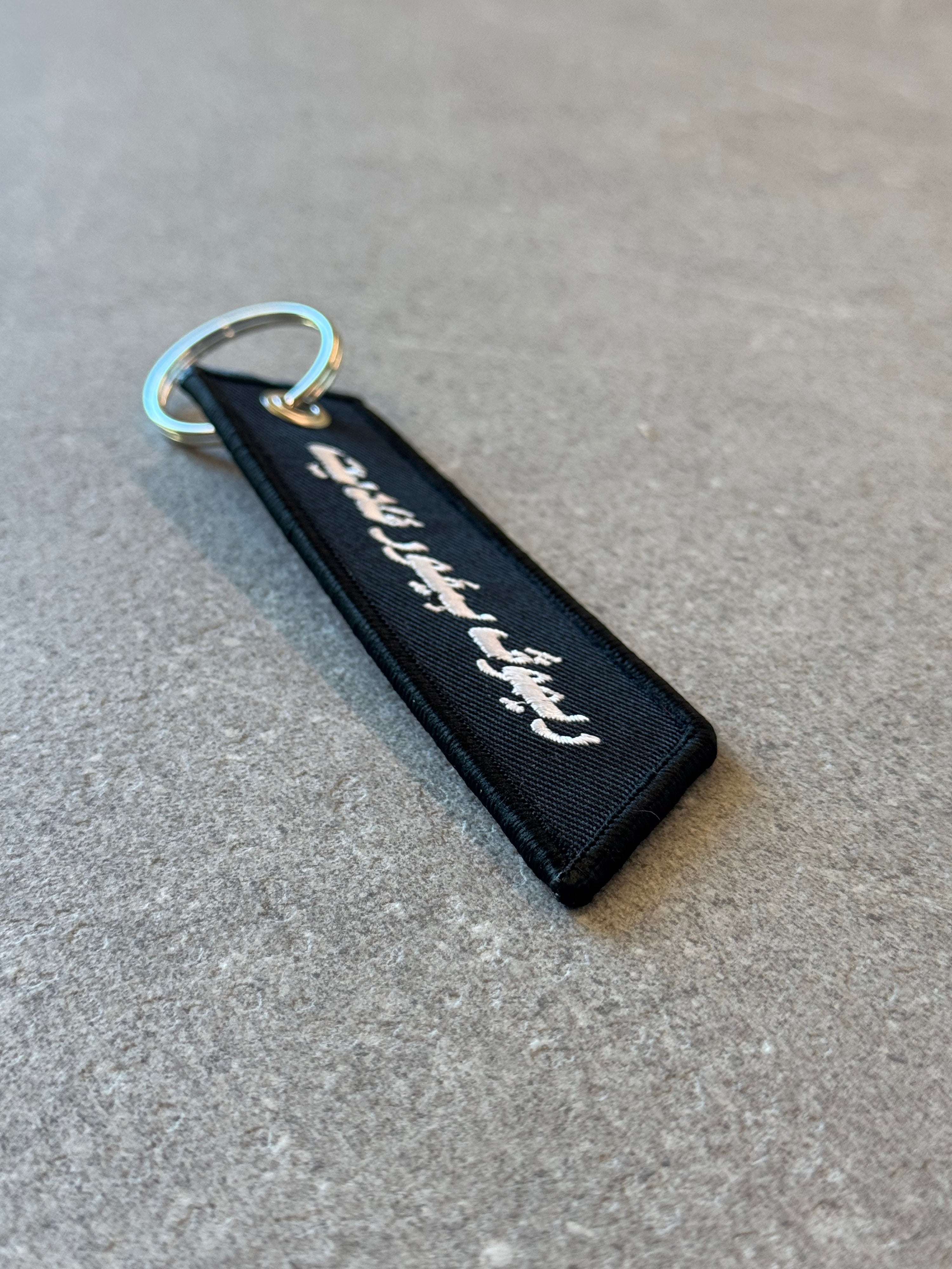 Remove Before Flight – Arabic Edition Keychain
