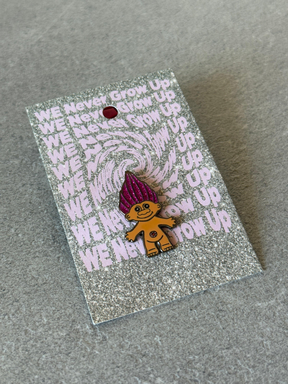 Glitter troll pin, close-up