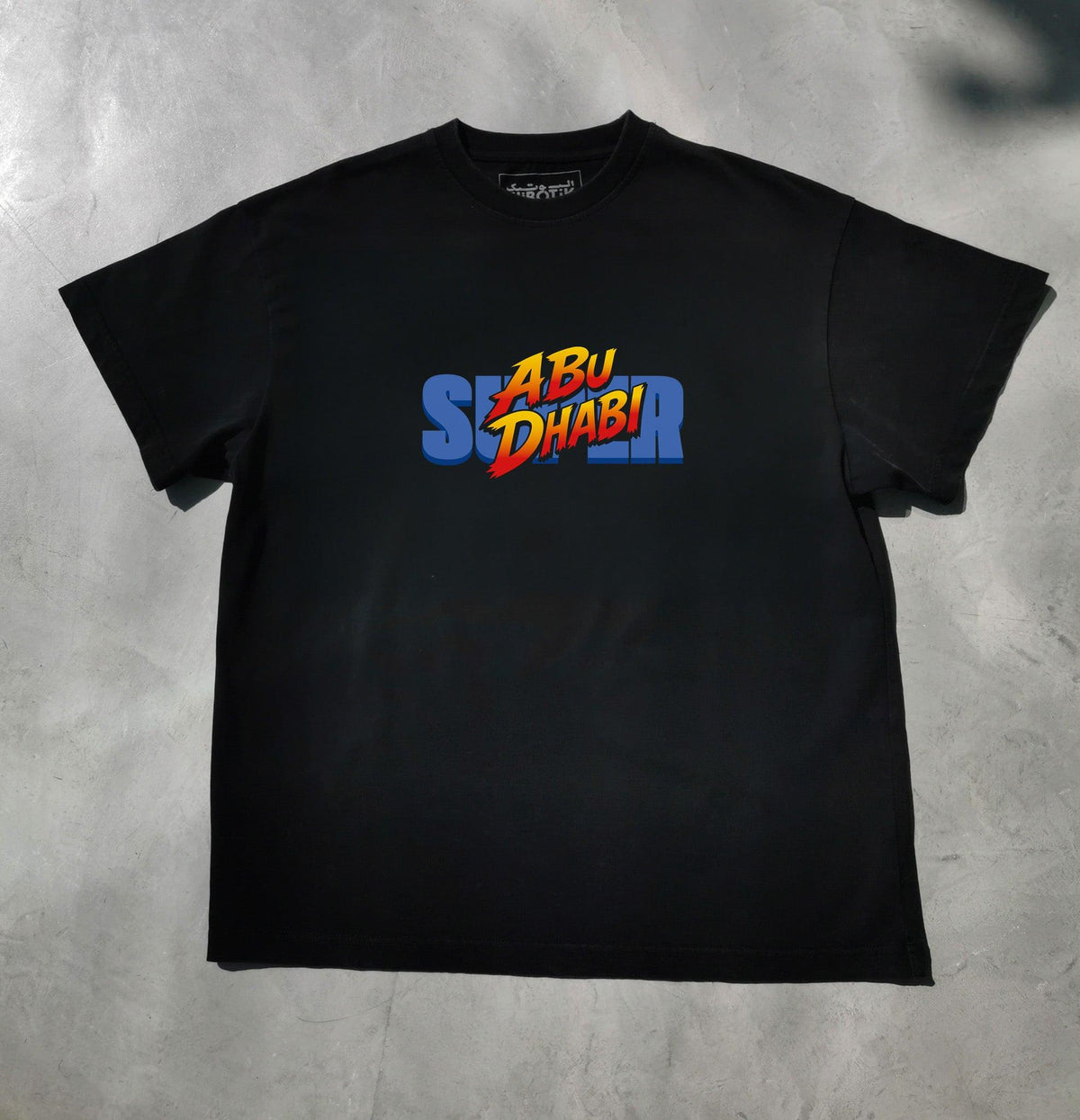 Super Abu Dhabi retro arcade tee in black, front view