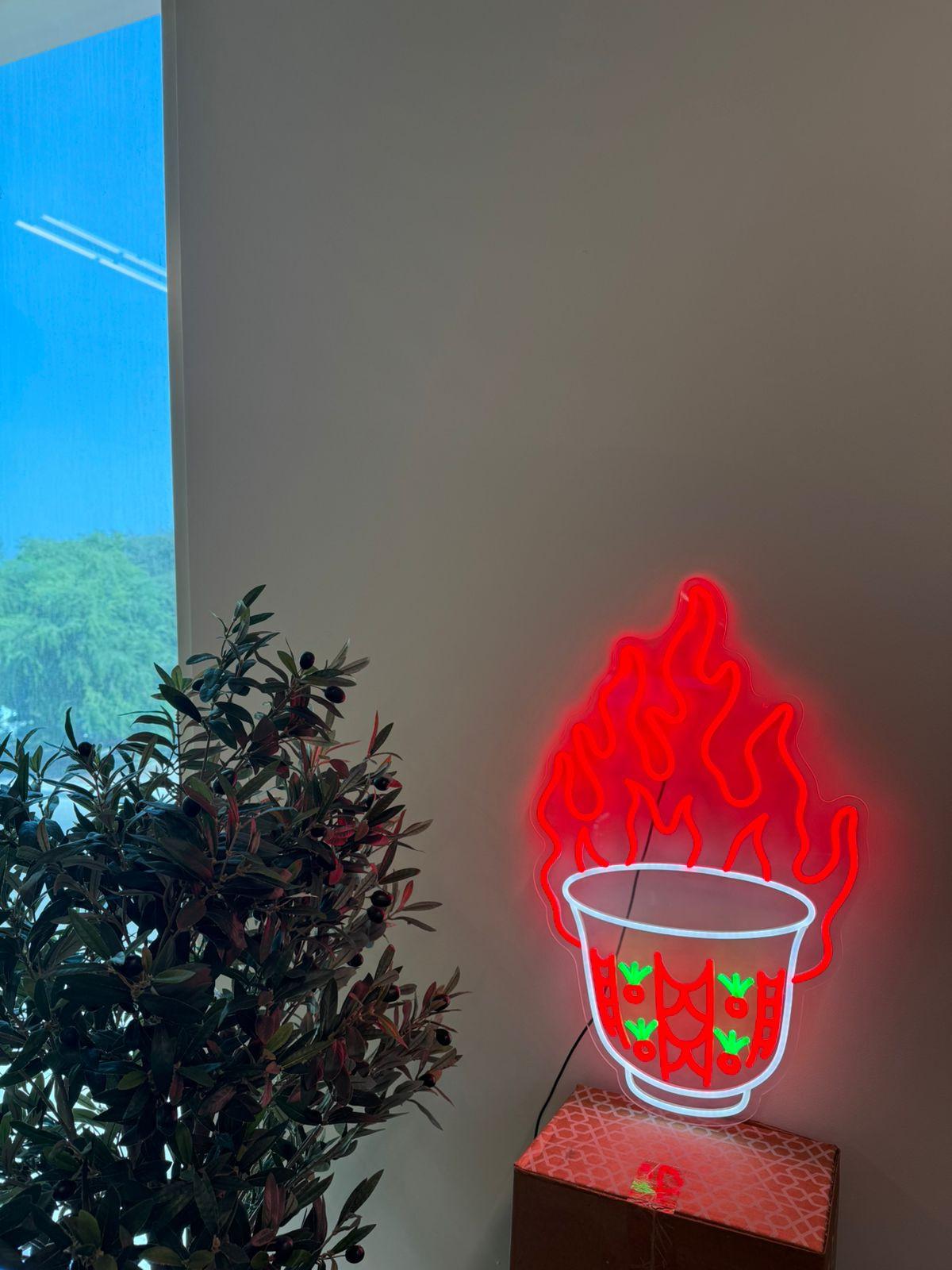 Finjan neon light mounted on a wall