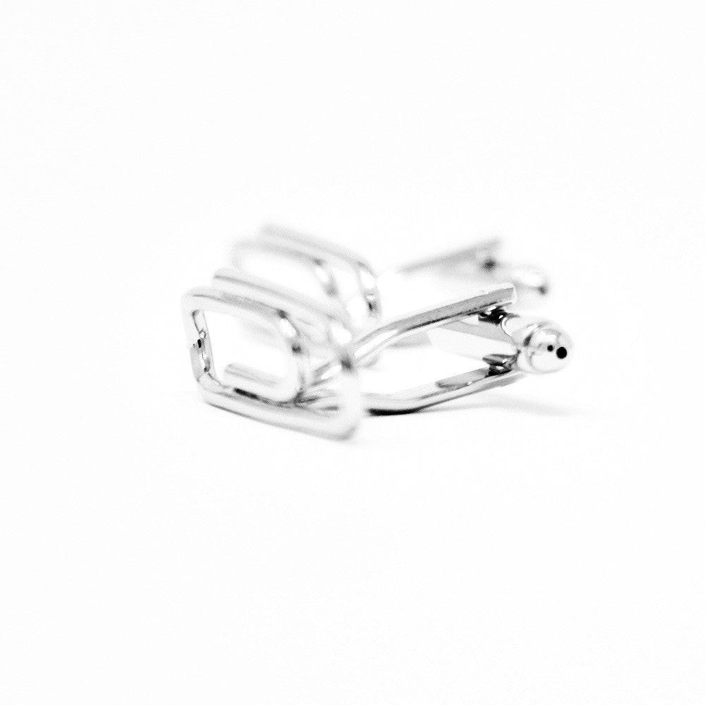 Paper clip cufflinks, close-up