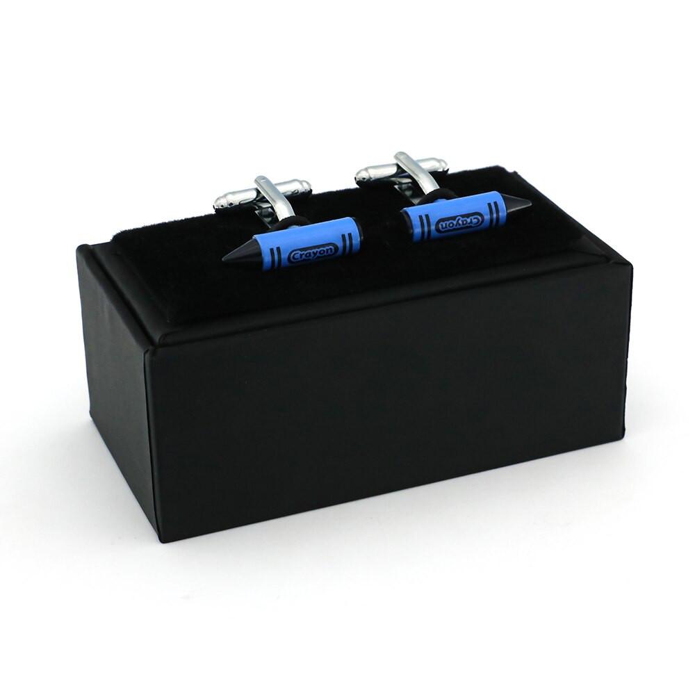 Blue crayon cufflinks on a shirt cuff