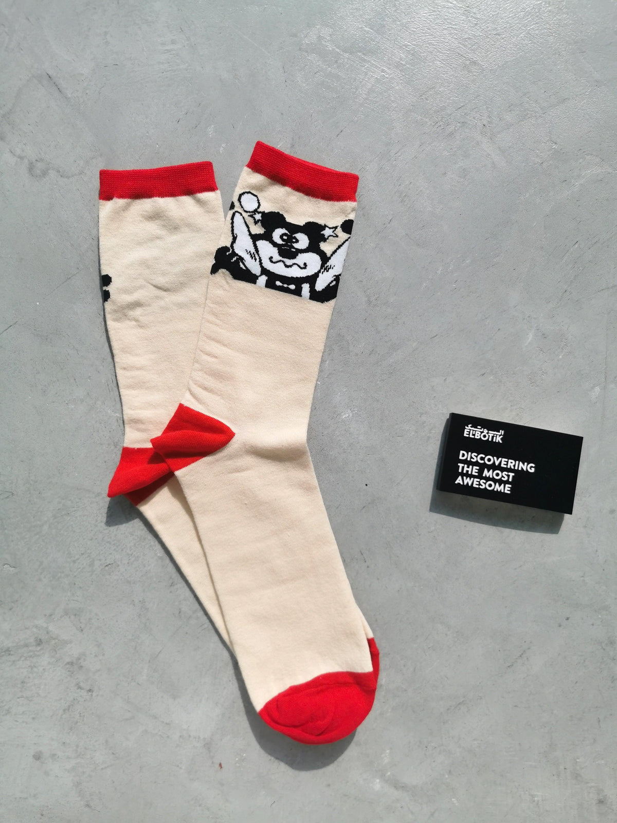 Beige cat gum socks worn