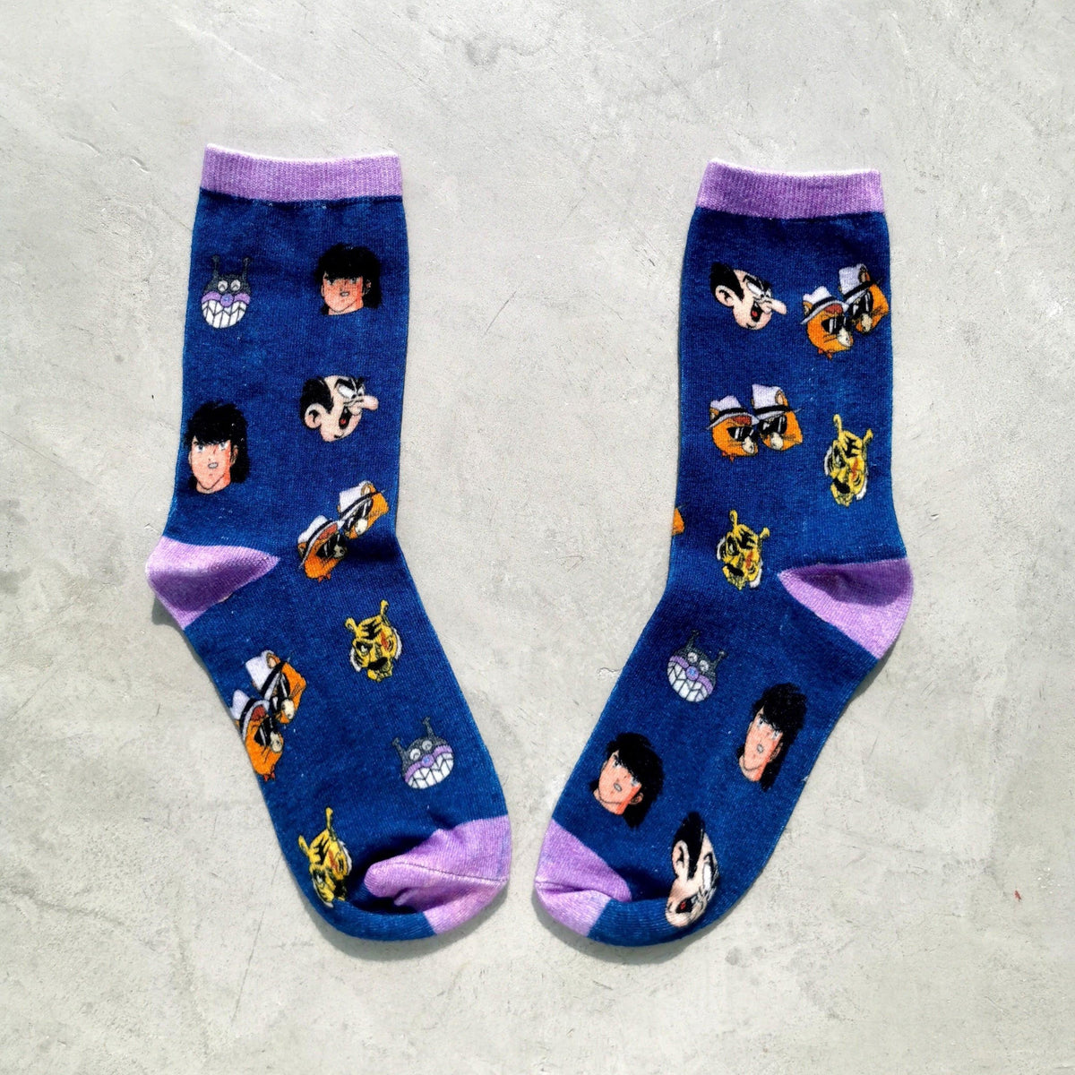 Cartoon villains socks by Elbotik, pair flat lay