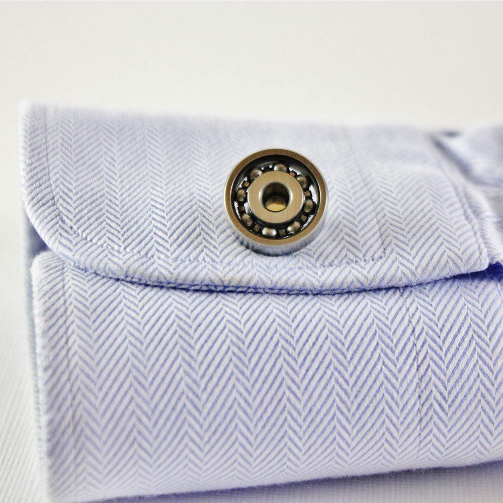 Ball bearing cufflinks on a shirt cuff