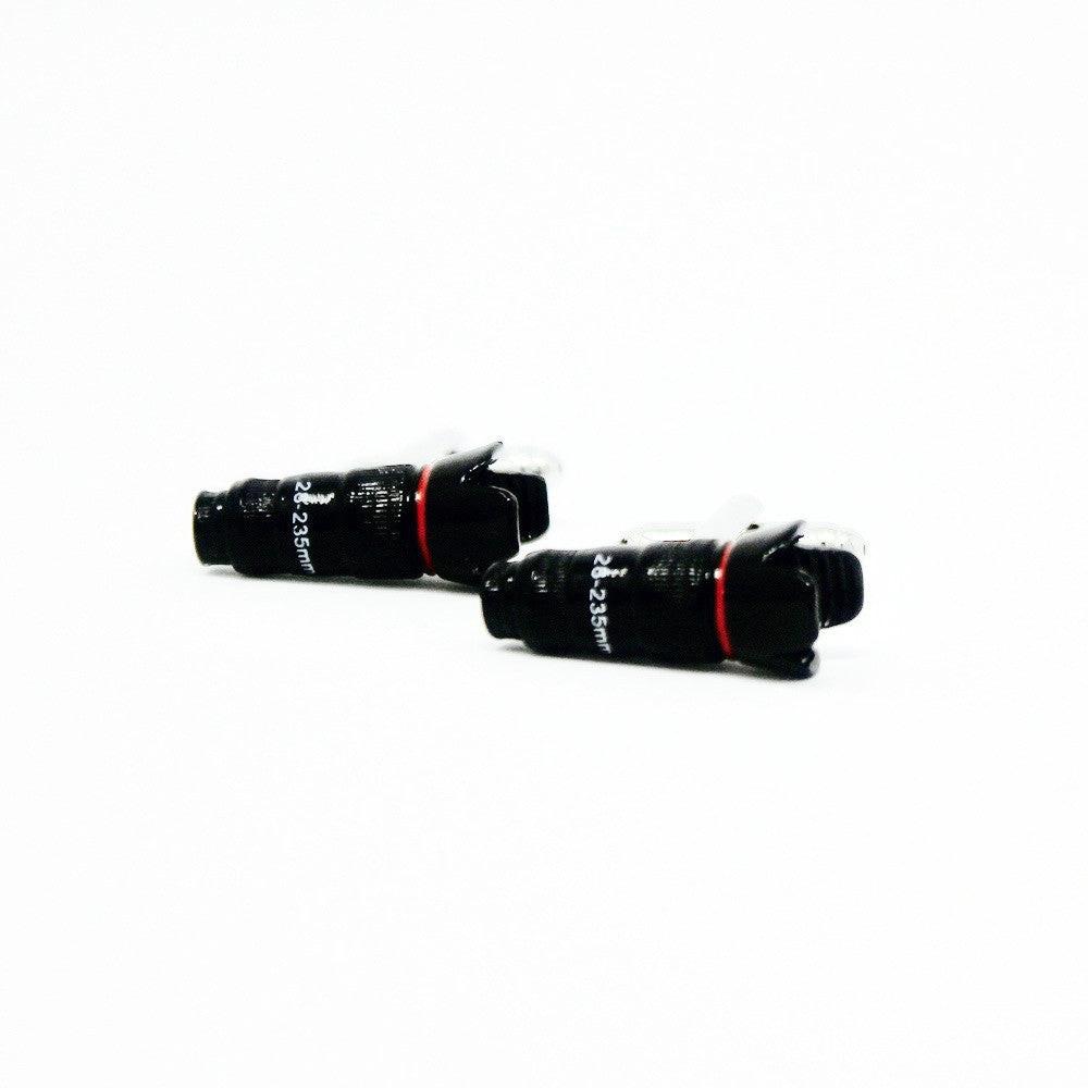 Camera lens cufflinks, close-up