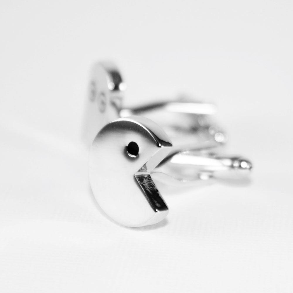 Retro arcade cufflinks, close-up